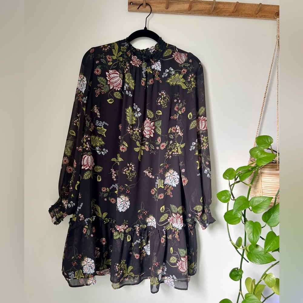 Floral mini dress with ruffles and sheer long sleeves